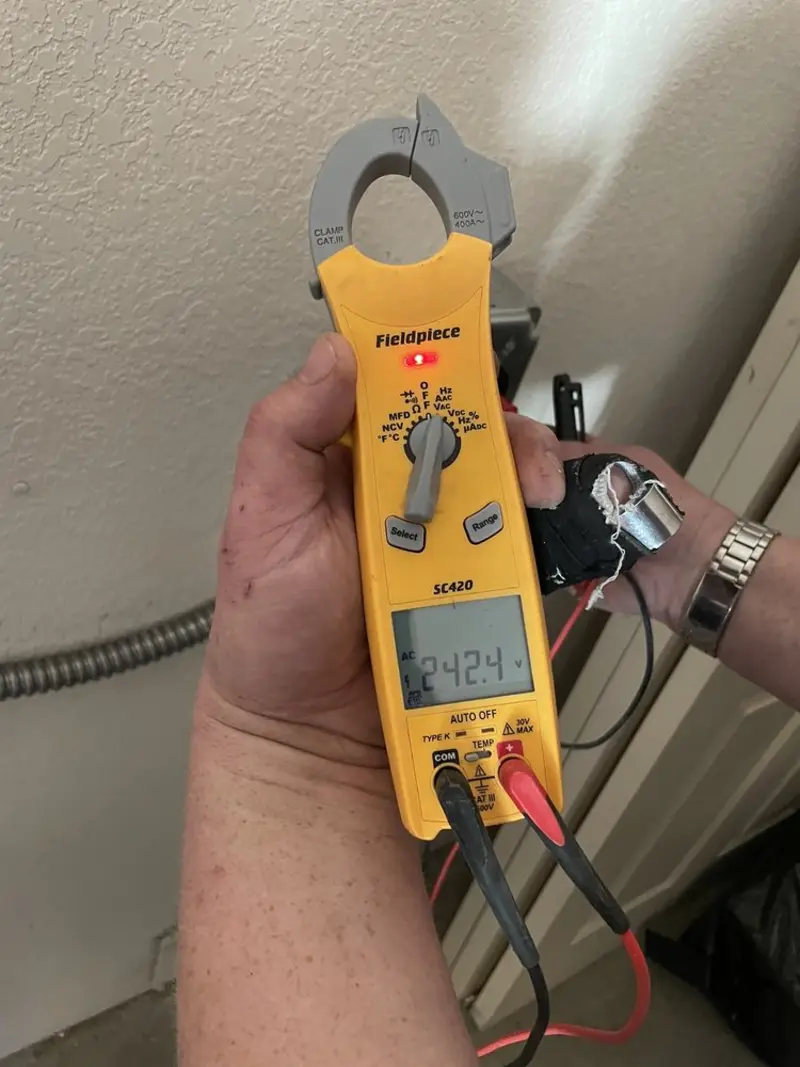 Voltage testing with clamp meter during Aluminum Wiring Replacement in Monticello